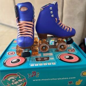 Moxi Purple Roller Skates with Peach Laces